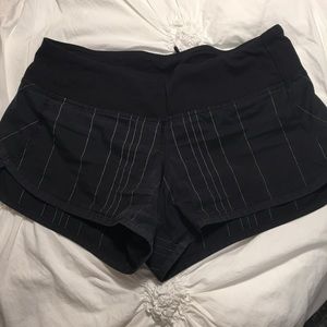 Black Lululemon shorts w/ reflective striping